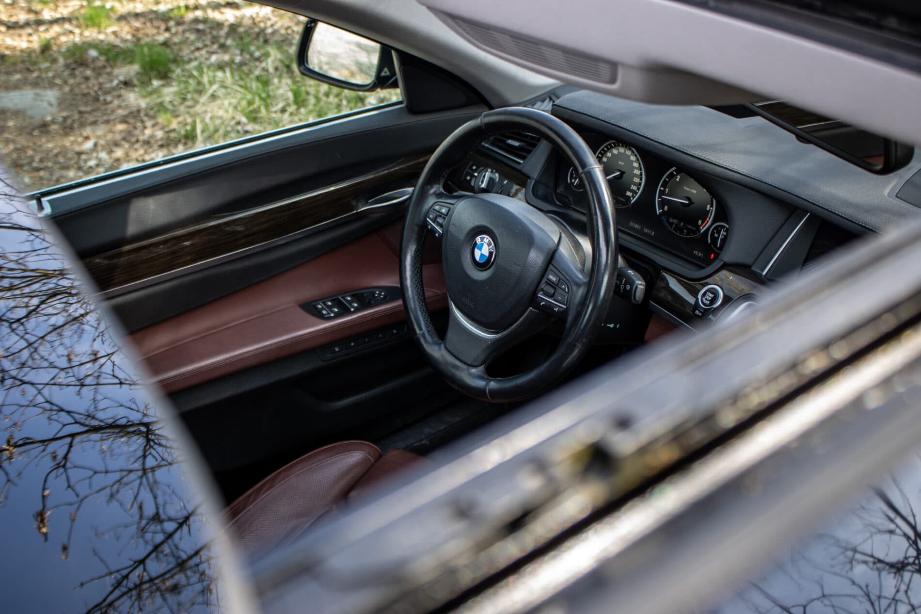 2013 BMW 750d, černá sedan, 231 861 km